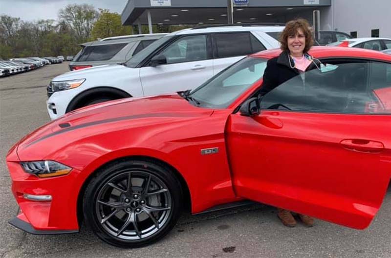 Renee with her new Mustang 2019 Ecoboost